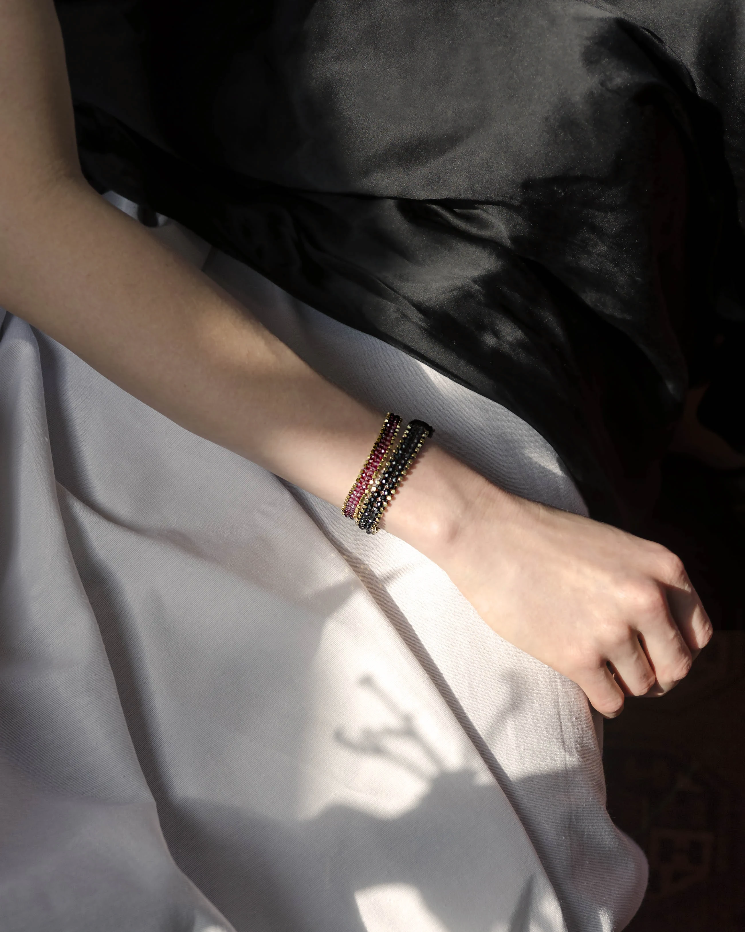 Garnet Gold Edge Bracelet — styled view