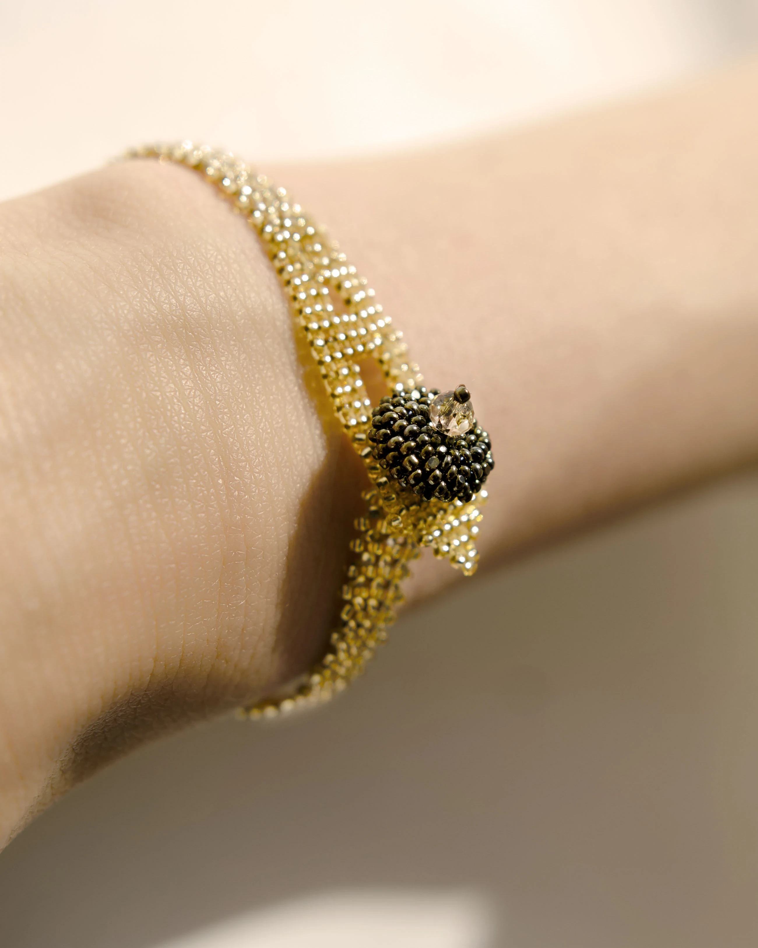 Golden Beaded Bismarck Bracelet — styled view