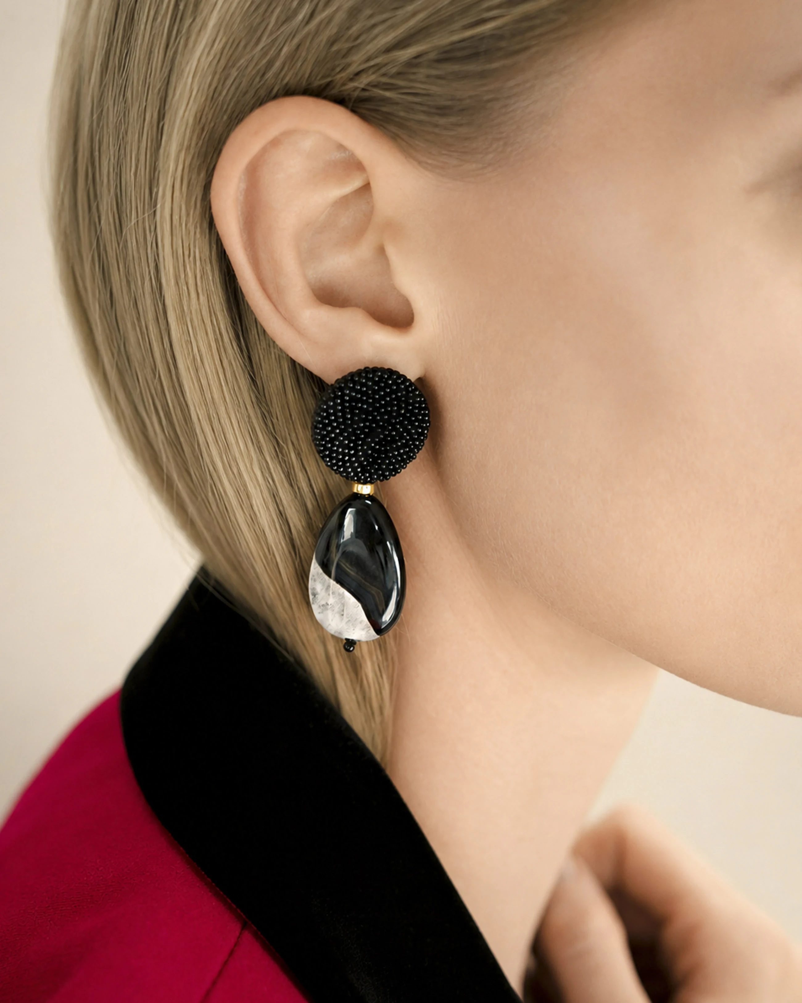 Black & White Agate Drop Earrings with Black Beaded Round Top — black and white marbled agate drop earring with black beaded round top, worn on model's ear.
